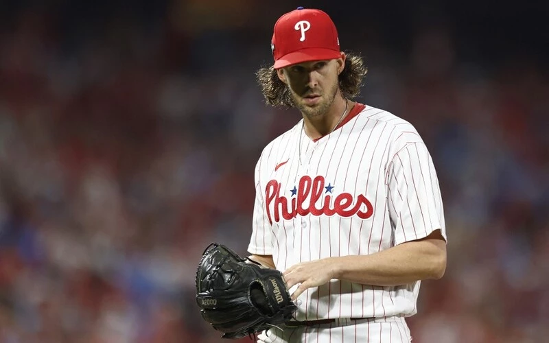 Aaron Nola #27 of the Philadelphia Phillies looks on in the first inning while playing the Arizona Diamondbacks during Game Two of the Championship Series at Citizens Bank Park on October 17, 2023 in Philadelphia, Pennsylvania. The Phillies vs Diamondbacks Odds are set for tonight's game.