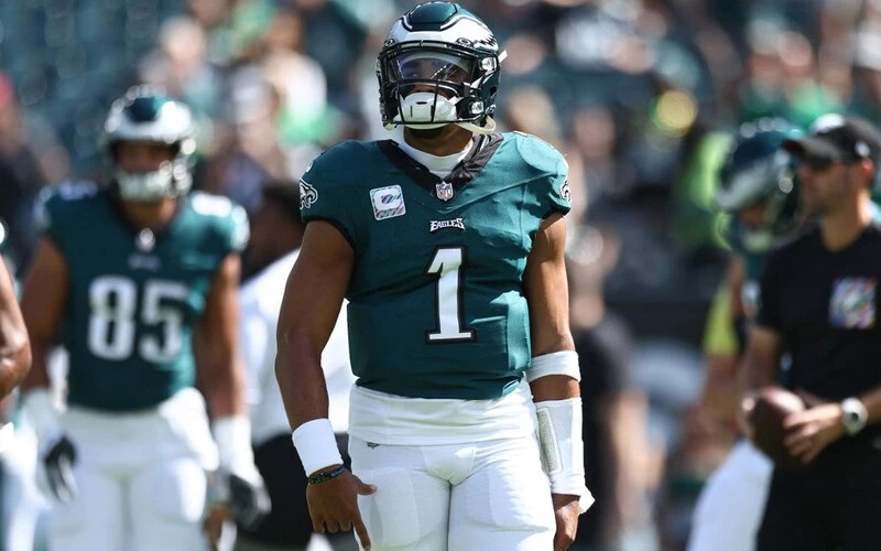 Jalen Hurts #1 of the Philadelphia Eagles warms up before the game against the Washington Commanders at Lincoln Financial Field on October 01, 2023 in Philadelphia, Pennsylvania. The Eagles vs Commanders Betting Odds are set.