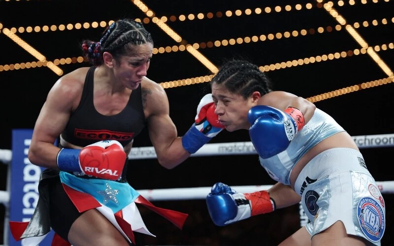manda Serrano punches Erika Cruz during their fight for Serrano, WBC, WBO and IBF featherweight titles and Cruz's WBA featherweight title at The Hulu Theater at Madison Square Garden. The Serrano vs Ramos prediction for the Weekend's Fight are set.