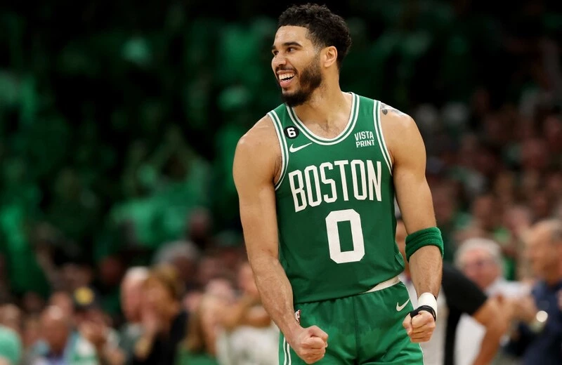 Jayson Tatum #0 of the Boston Celtics celebrates a basket against the Philadelphia 76ers during the fourth quarter in game seven of the 2023 NBA Playoffs Eastern Conference Semifinals at TD Garden on May 14, 2023 in Boston, Massachusetts. The Celtics vs 76ers Odds are set for to night's game.