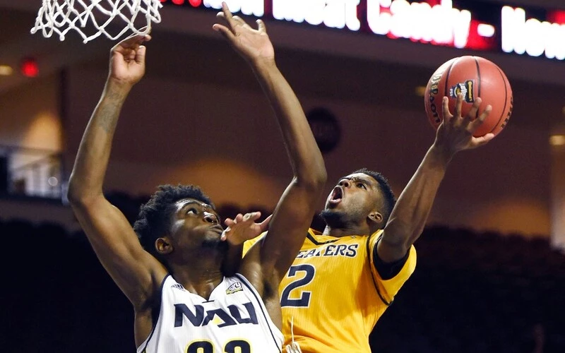Max Hazzard #2 of the UC Irvine Anteaters shoots against Isaiah Thomas #33 of the Northern Arizona Lumberjacks during the 2017 Continental Tire Las Vegas Invitational basketball tournament at the Orleans Arena on November 24, 2017 in Las Vegas, Nevada. UC Irvine won 77-71. he NCAAB Opening Day with the Northern Arizona vs UConn Odds are set.