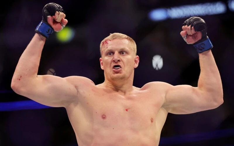 Sergei Pavlovich of Russia celebrates after knocking out Derrick Lewis in the first round of their heavyweight bout during UFC 277 at American Airlines Center on July 30, 2022 in Dallas, Texas. The Pavlovich vs Aspinall prediction is set for Saturday's UFC Main Event.