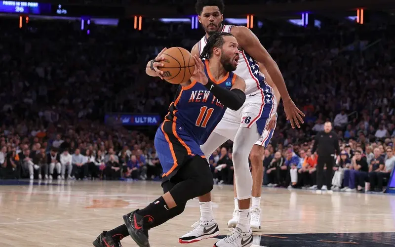 Jalen Brunson #11 of the New York Knicks heads for the net as Tobias Harris #12 of the Philadelphia 76ers defends during the second half at Madison Square Garden on April 30, 2024 in New York City. The Philadelphia 76ers defeated the New York Knicks 112-106 in overtime